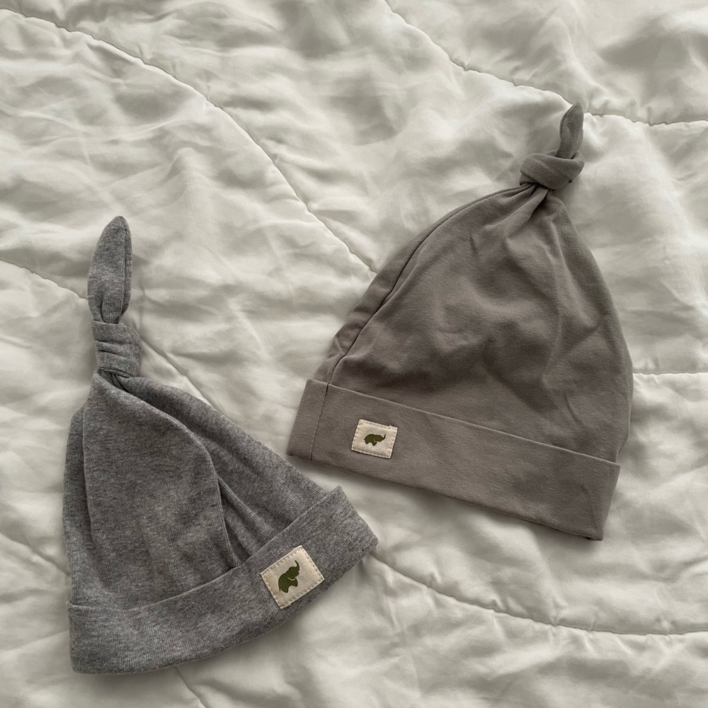 Two Monica + Andy baby hats